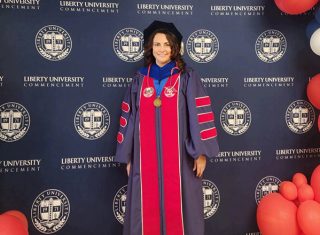 Dr. Sabogal-Rodriguez celebrates graduation day, May 2024.