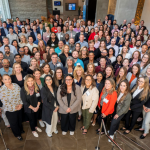 RQI Partners staff members posing for a picture all together,