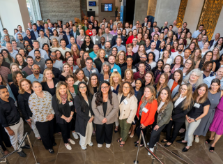 RQI Partners staff members posing for a picture all together,