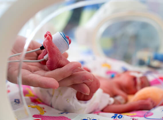 Doctor with a new born