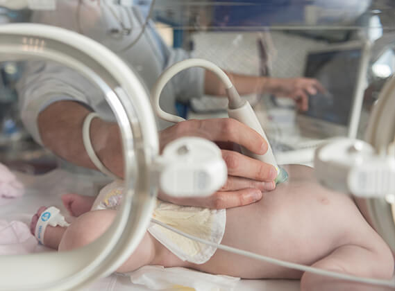 Doctor with a new born
