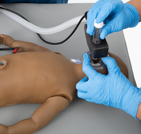 Nurse training and practicing infant CPR on a simulation mannequin